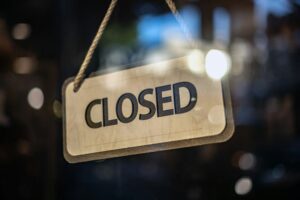 closed sign on a window